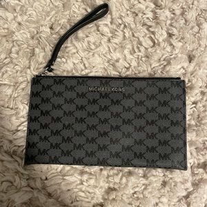 New without tags MK clutch